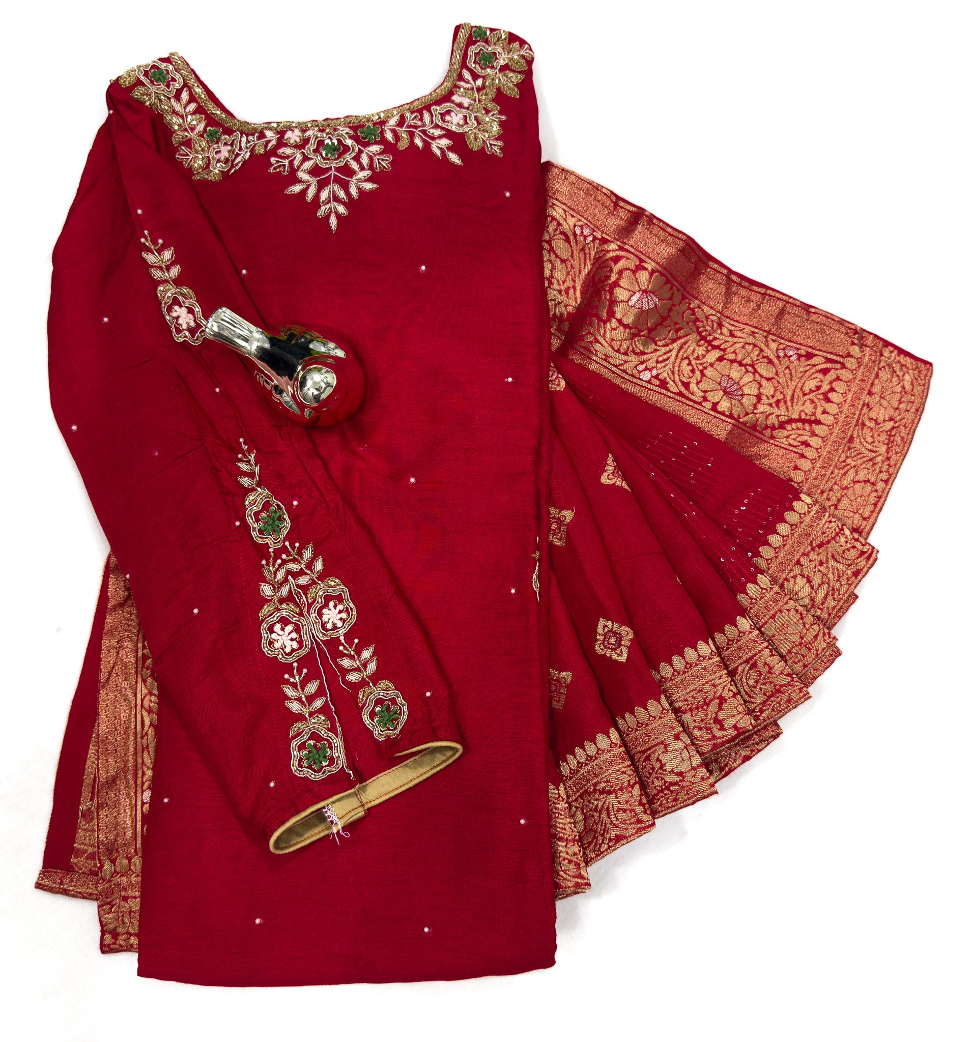 Red embroidered traditional outfit with gold details on a white background